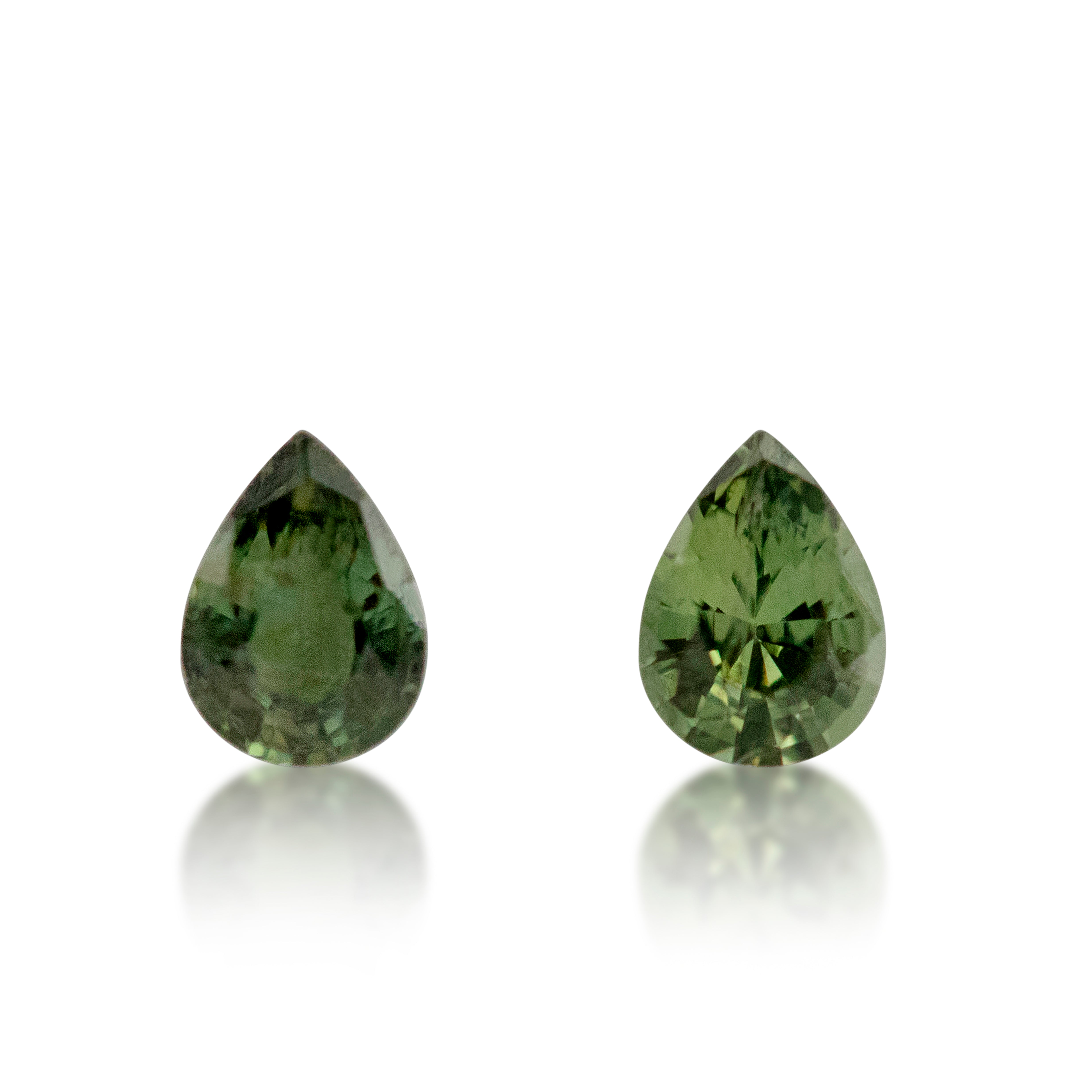 A pair of green Green sapphires, pear shape 2 = 0.30 cts, natural loose gemstones