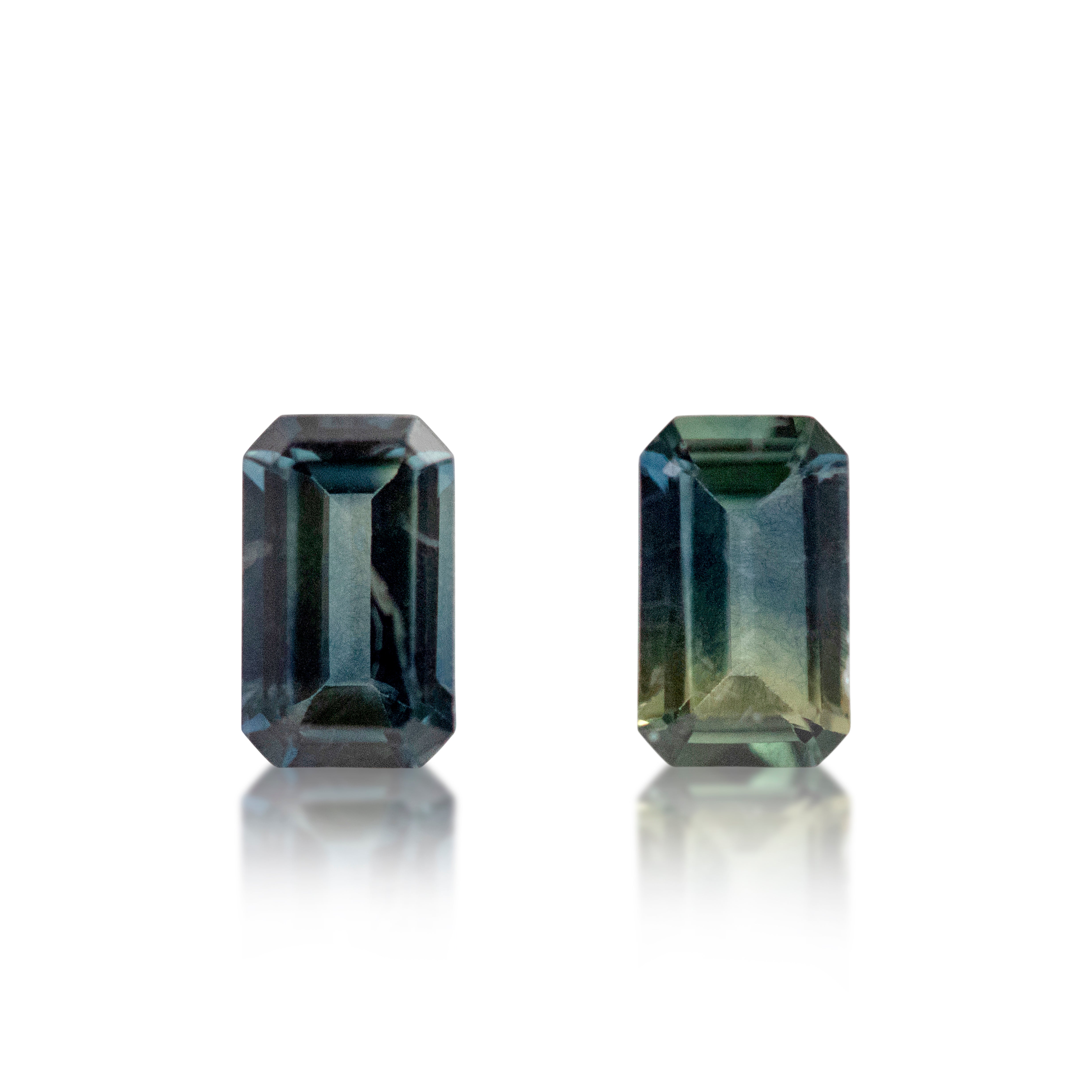 A pair of green parti sapphires, pear shape 2 = 0.62 cts, natural loose gemstones