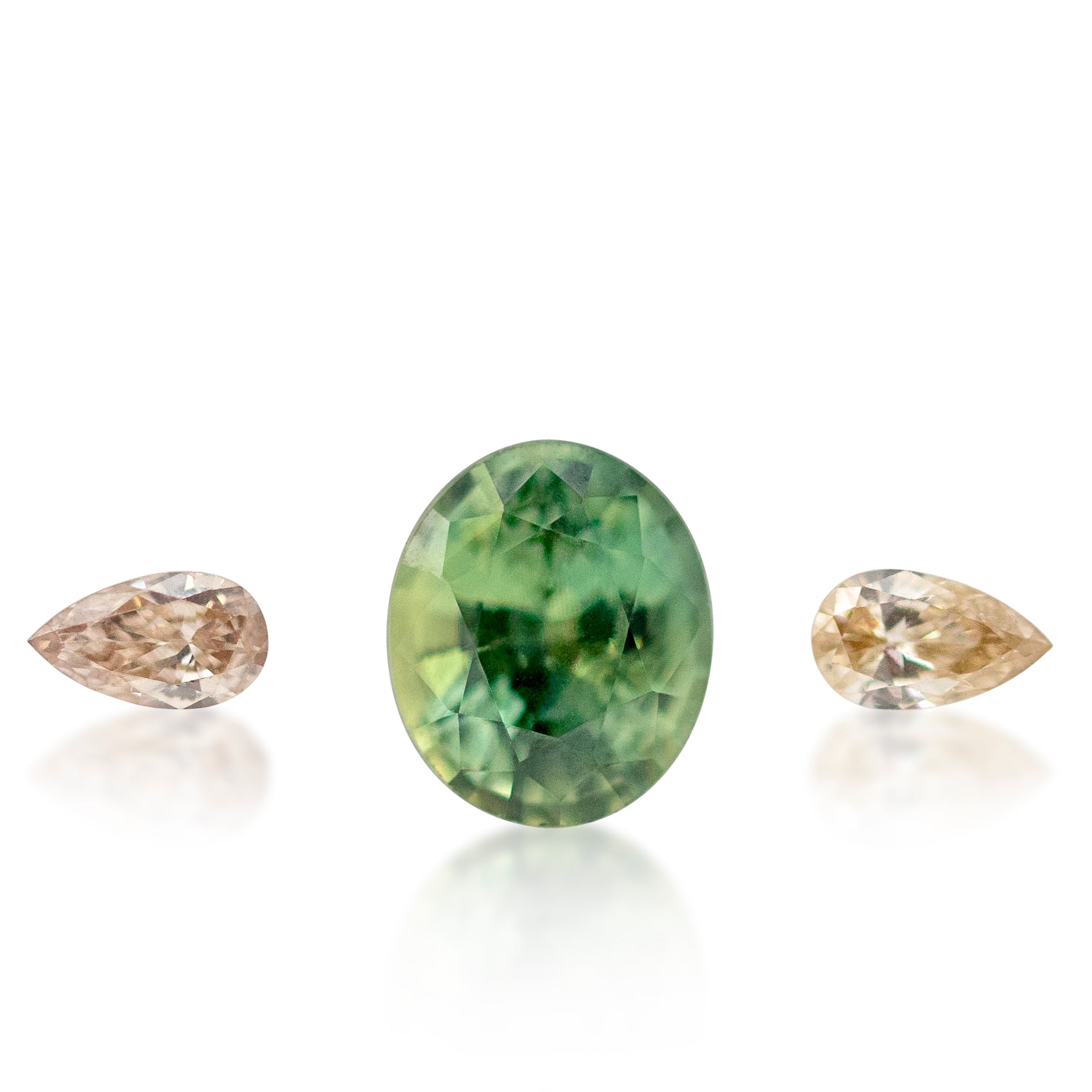 0.70ct Oval Cut Green Parti Sapphire & Champagne Pair Set