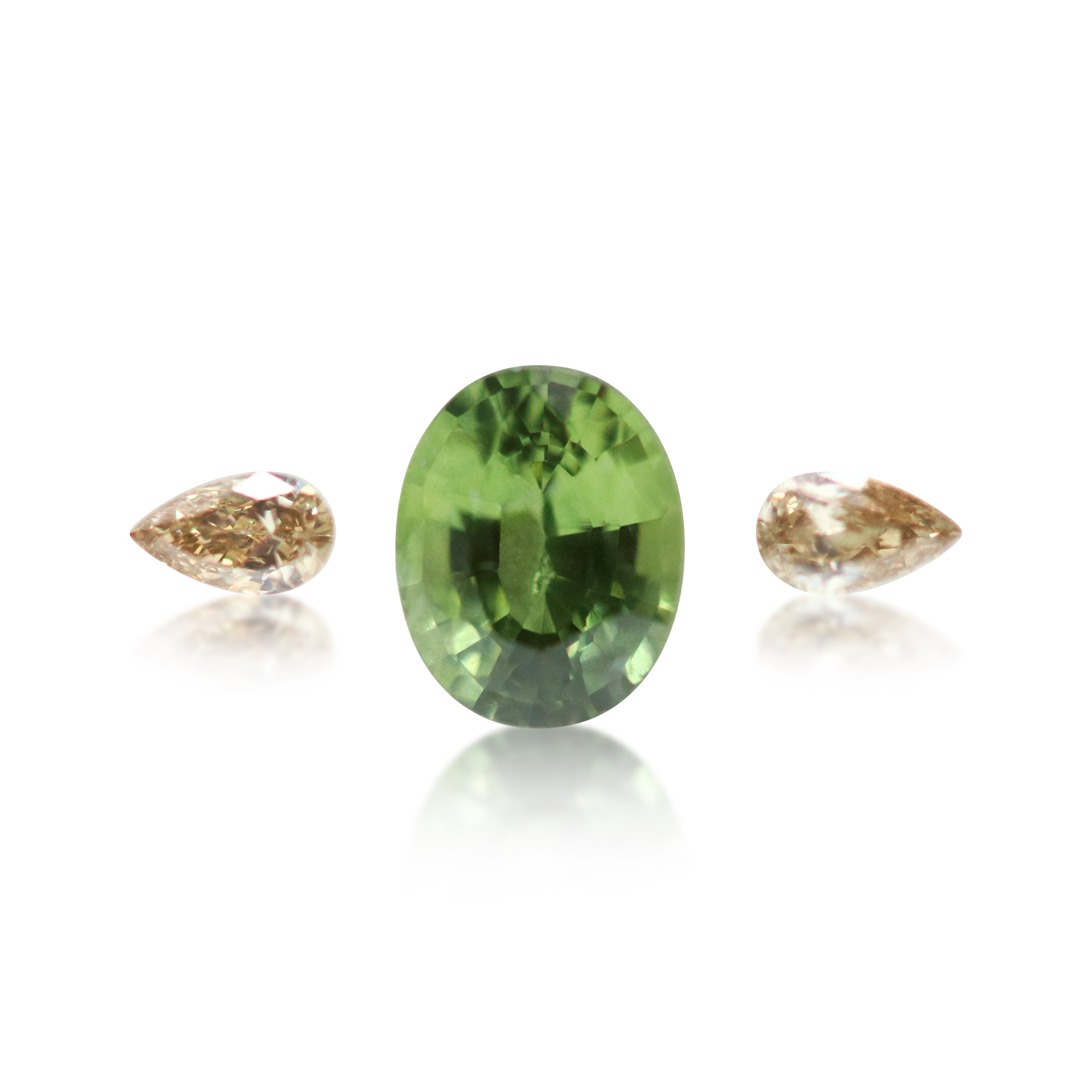 0.80 ct Parti Sapphire & 2 = 0.09 ct Argyle Champagne Pear Cut Diamonds