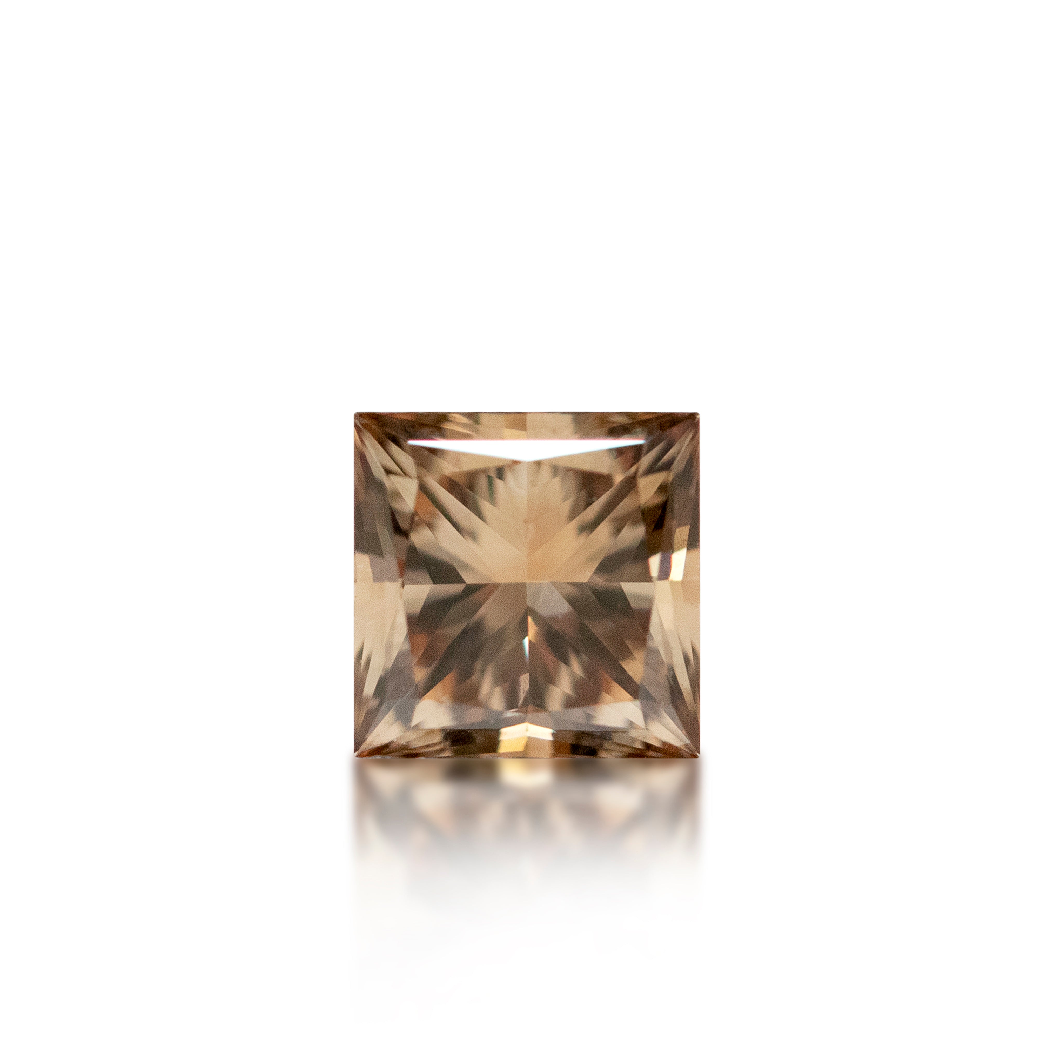 A single square princess-cut gemstone with a warm champagne brown color, centered on a clean white background with a soft reflection below.