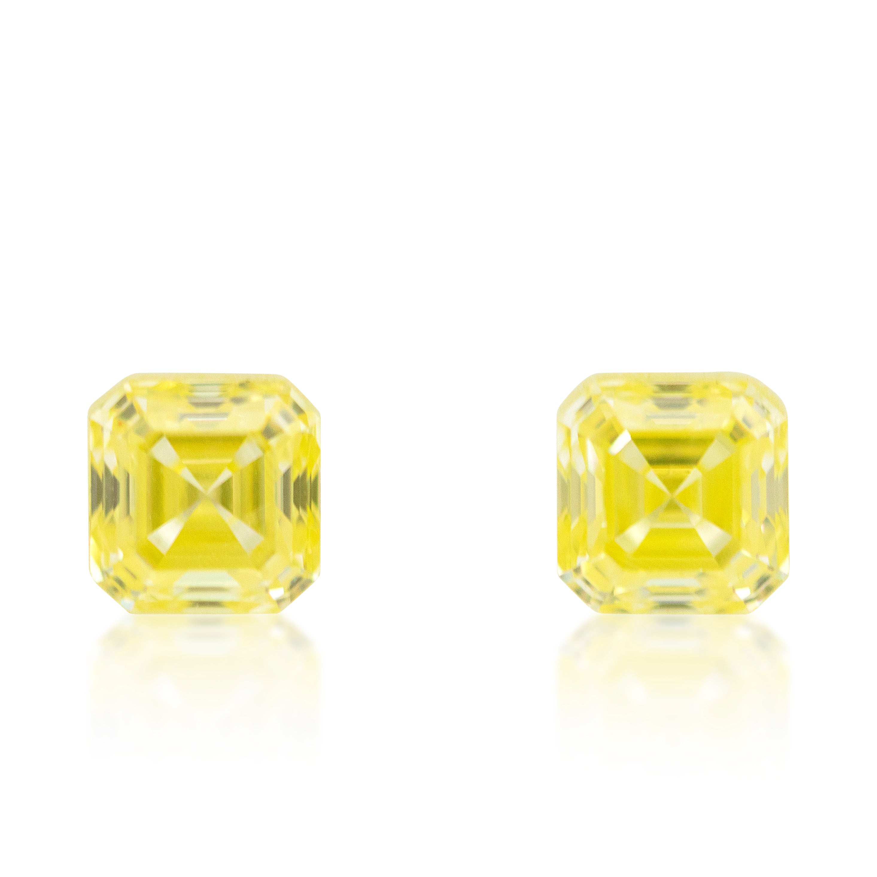 2 = 0.78ct Asscher Cut Fancy Vivid Yellow