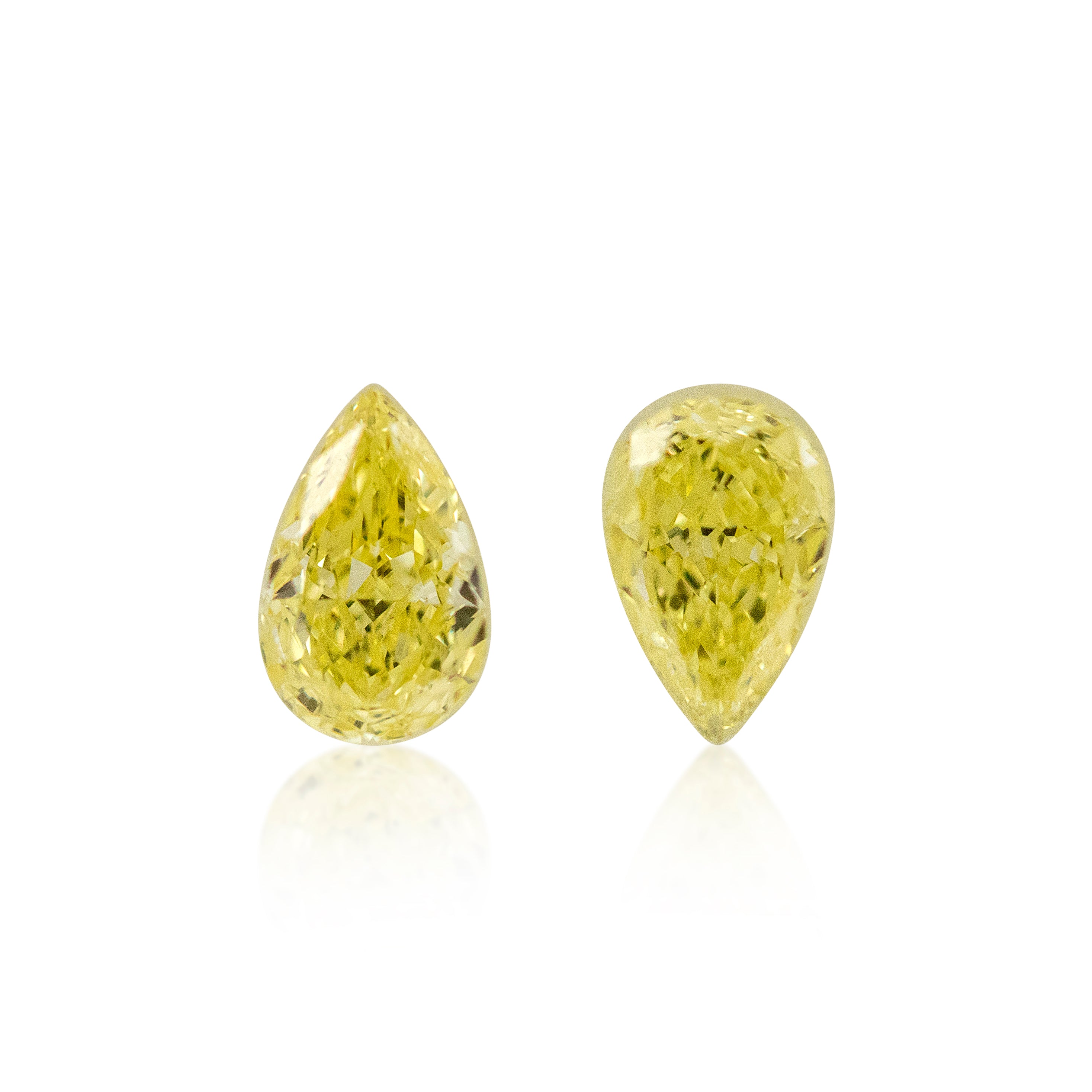 2 = 0.77 ct Pear Cut Fancy Yellow Diamonds